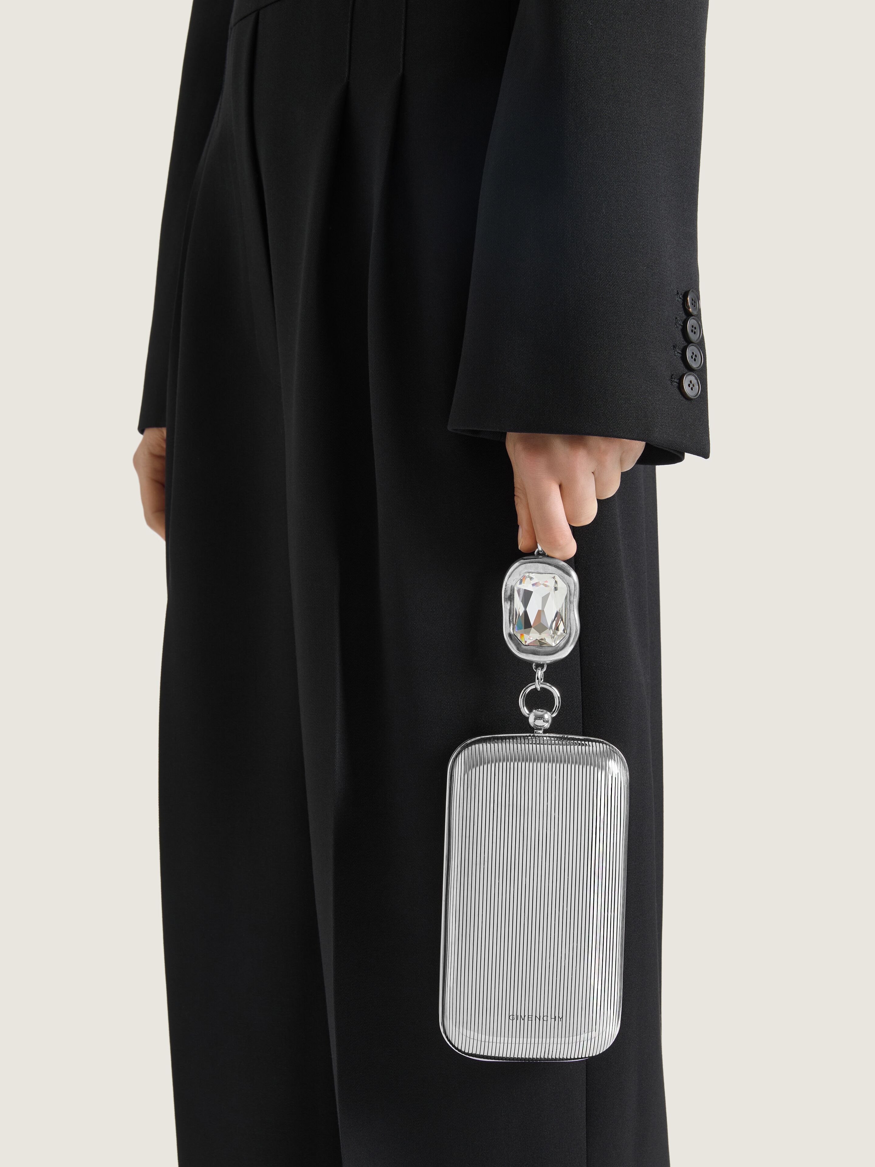 Evening clutch in metal with crystal jewel